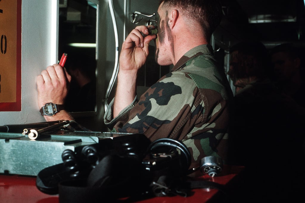 A Marine wearing camouflage face paint participates in Exercise SOLID  SHIELD '83, on the side of the aggressors - PICRYL - Public Domain Media  Search Engine Public Domain Search