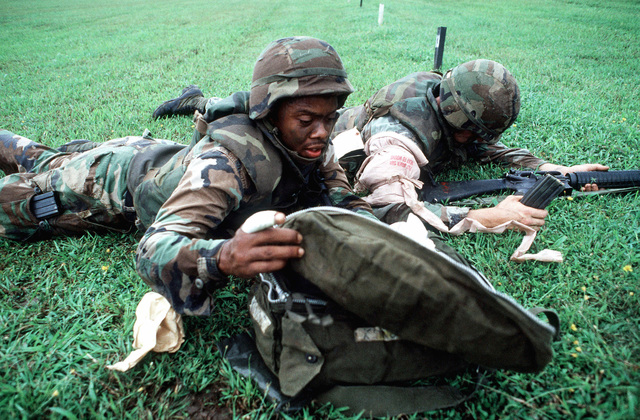 A Navy corpsman attached to the 2nd Light Armored Infantry Battalion ...