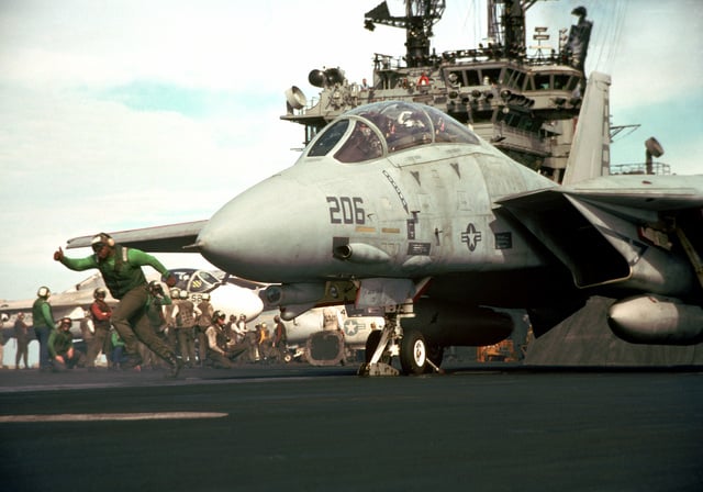 A Catapult Crewman Moves Out Of The Way After A Final Pre Launch Check