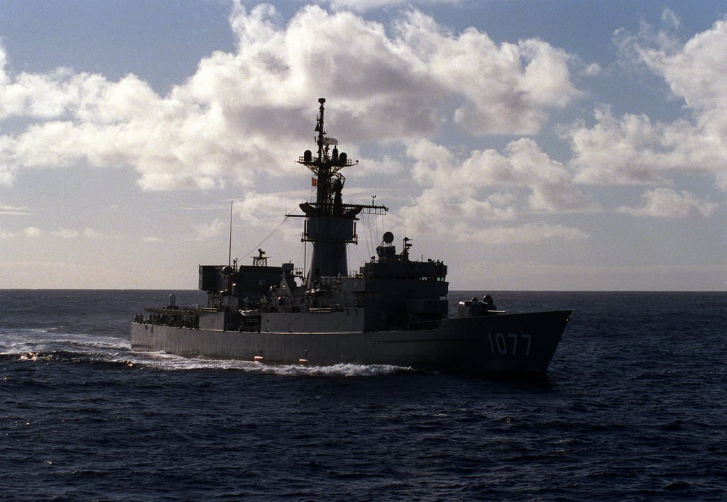 A starboard bow view of the frigate USS OUELLET (FF-1077) underway near ...