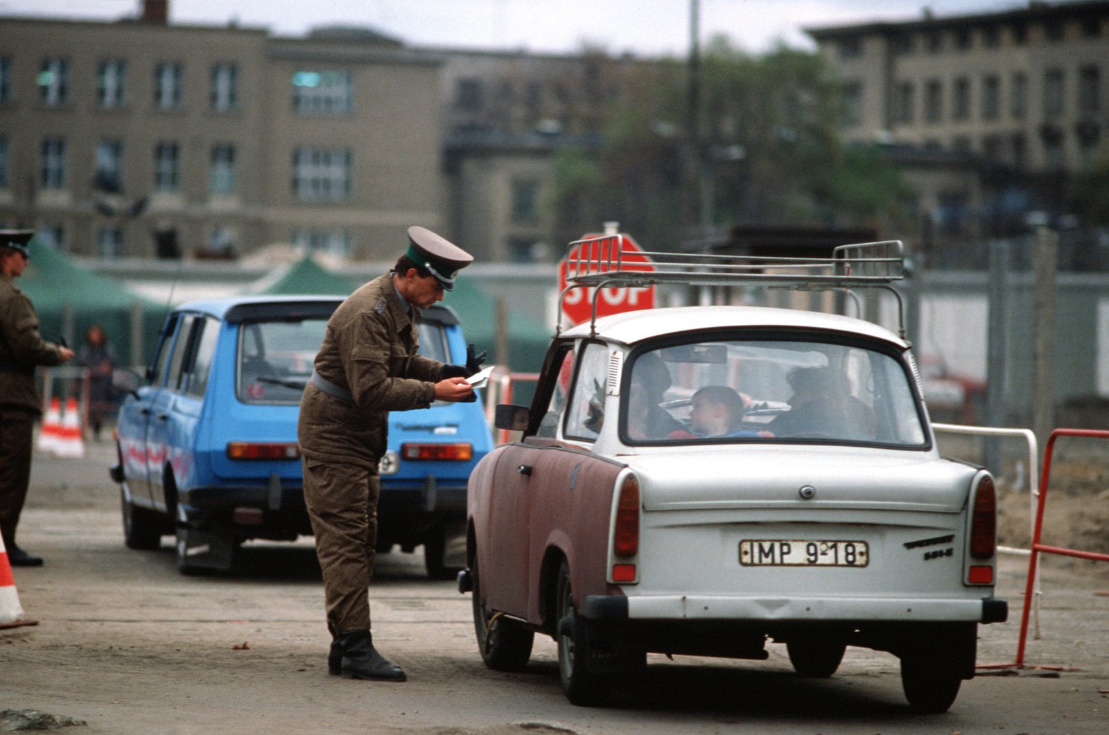 An East German Policeman Monitors Traffic Returning To East Berlin Through The Newly Created Opening In The Berlin Wall At Potsdamer Platz U S National Archives Public Domain Image