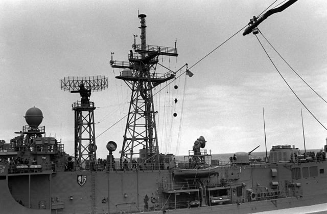 A fuel hose is highlined from the combat stores ship USNS SPICA (T-AFS ...