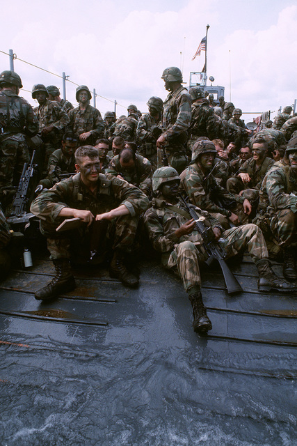 Soldiers of the 82nd Airborne Division ride across Gatun Lake aboard an ...