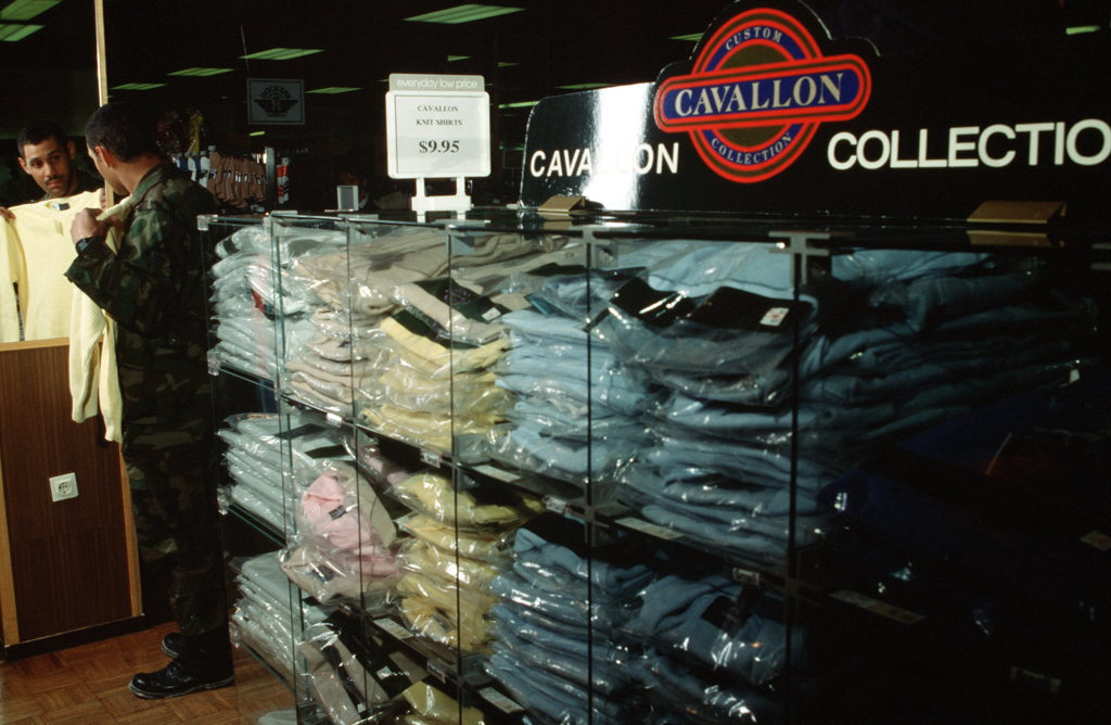 A customer shops for clothing in a base exchange store at the Army/Air  Force Exchange Service facilities - PICRYL - Public Domain Media Search  Engine Public Domain Image