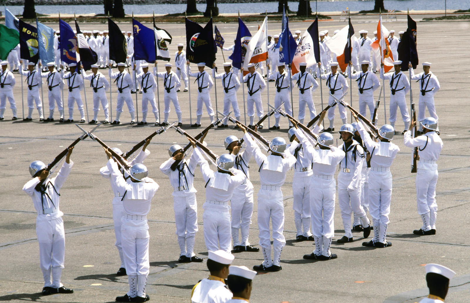 a-united-states-us-navy-drill-team-performs-a-rifle-routine-during-a