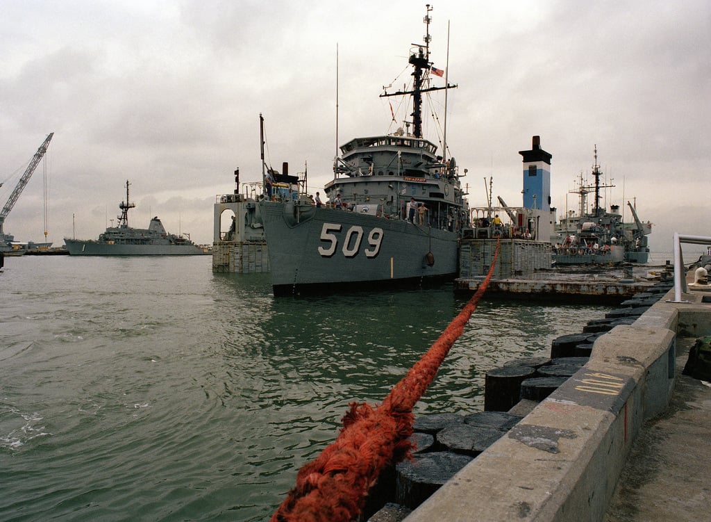 The ocean minesweeper USS ADROIT (MSO-509) lies tied up over the ...