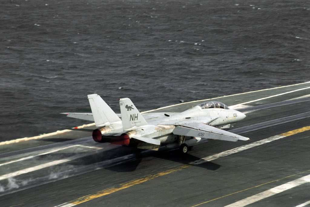 A Fighter Squadron 114 (VF-114) F-14A Tomcat aircraft is launched from ...