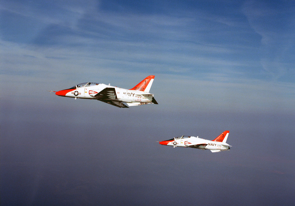 Left side view of two T-45A Goshawk trainer aircraft in flight over the ...