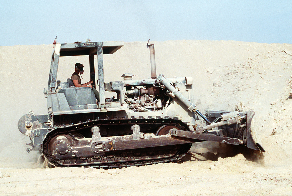 A Seabee from Naval Mobile Construction Battalion 40 (NMCB-40