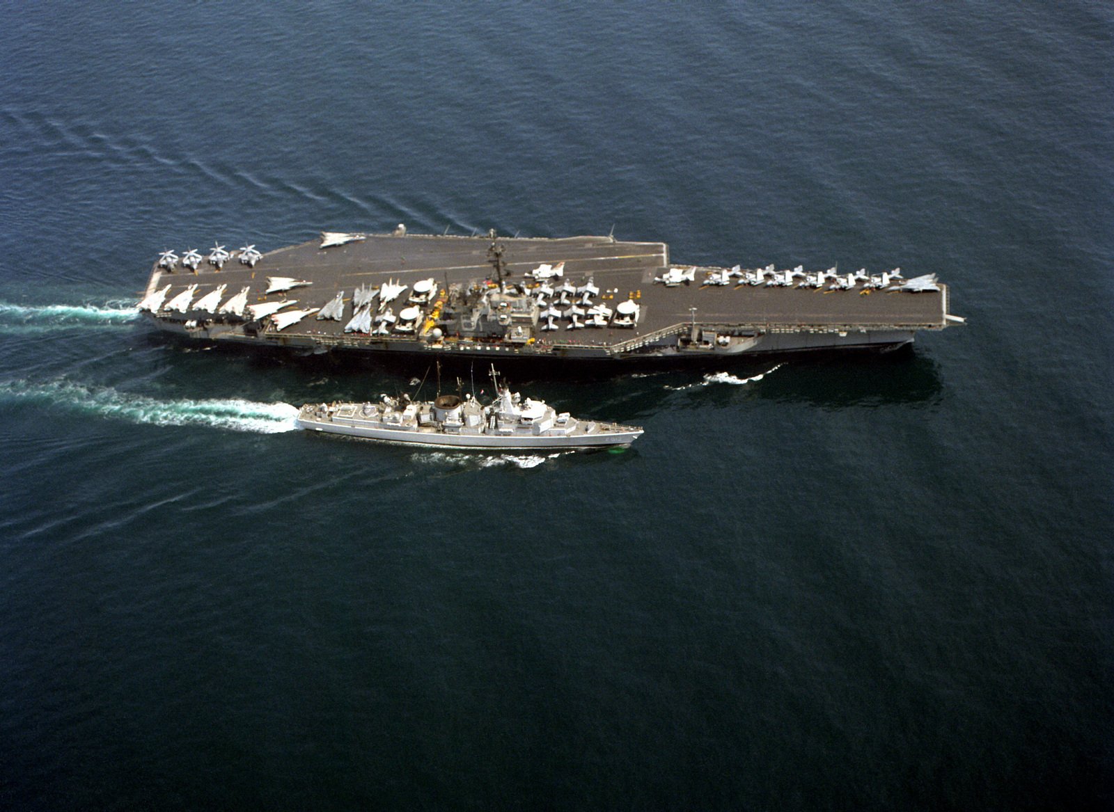 An overhead view of the aircraft carrier USS RANGER (CV-61) conducting ...