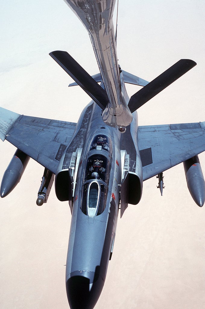 F-4G Phantom fighter aircraft from the 35th Tactical Fighter Wing, Tactical  Air Command, fly over the coastline of Bahrain during Operation Desert  Shield. The aircraft are armed with AGM-88 high-speed, anti-radiation,  air-to-surface