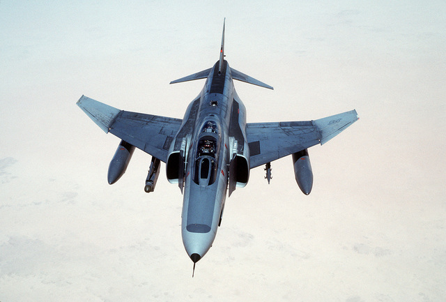 A 35th Tactical Fighter Wing F-4E Phantom II aircraft passes over the ...