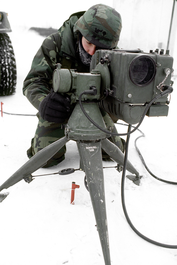 US Navy Engineman 2nd Class Anthony Bartelli (right) holds an