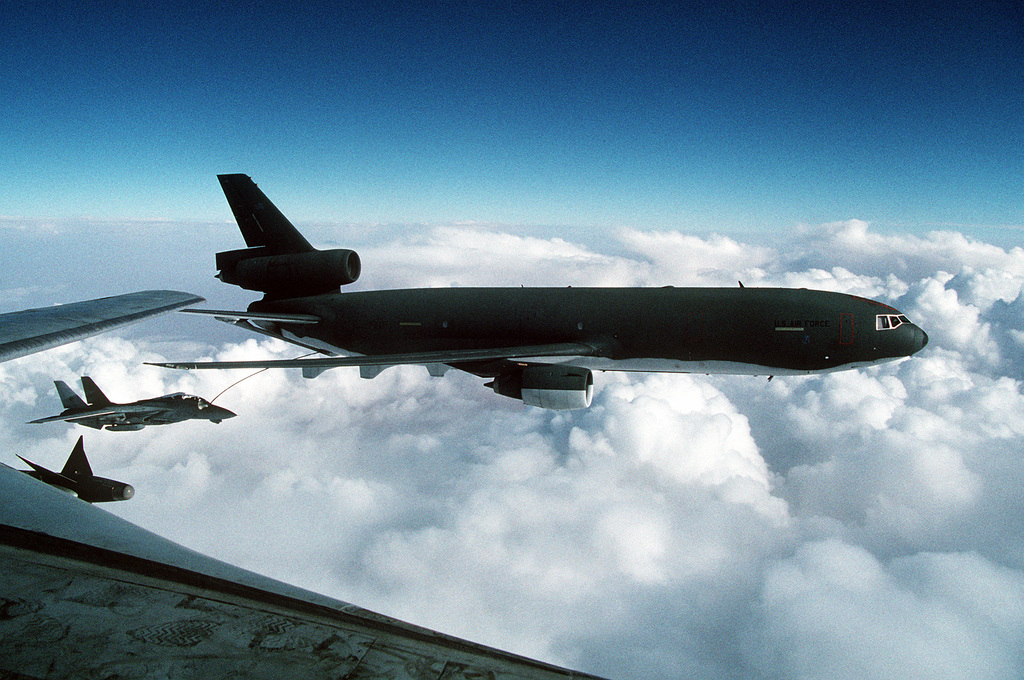 A Fighter Squadron 74 (VF-74) F-14A Tomcat aircraft refuels from a U.S ...