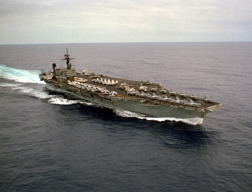 A Starboard Bow View Of The Aircraft Carrier Uss John F. Kennedy (cv-67 