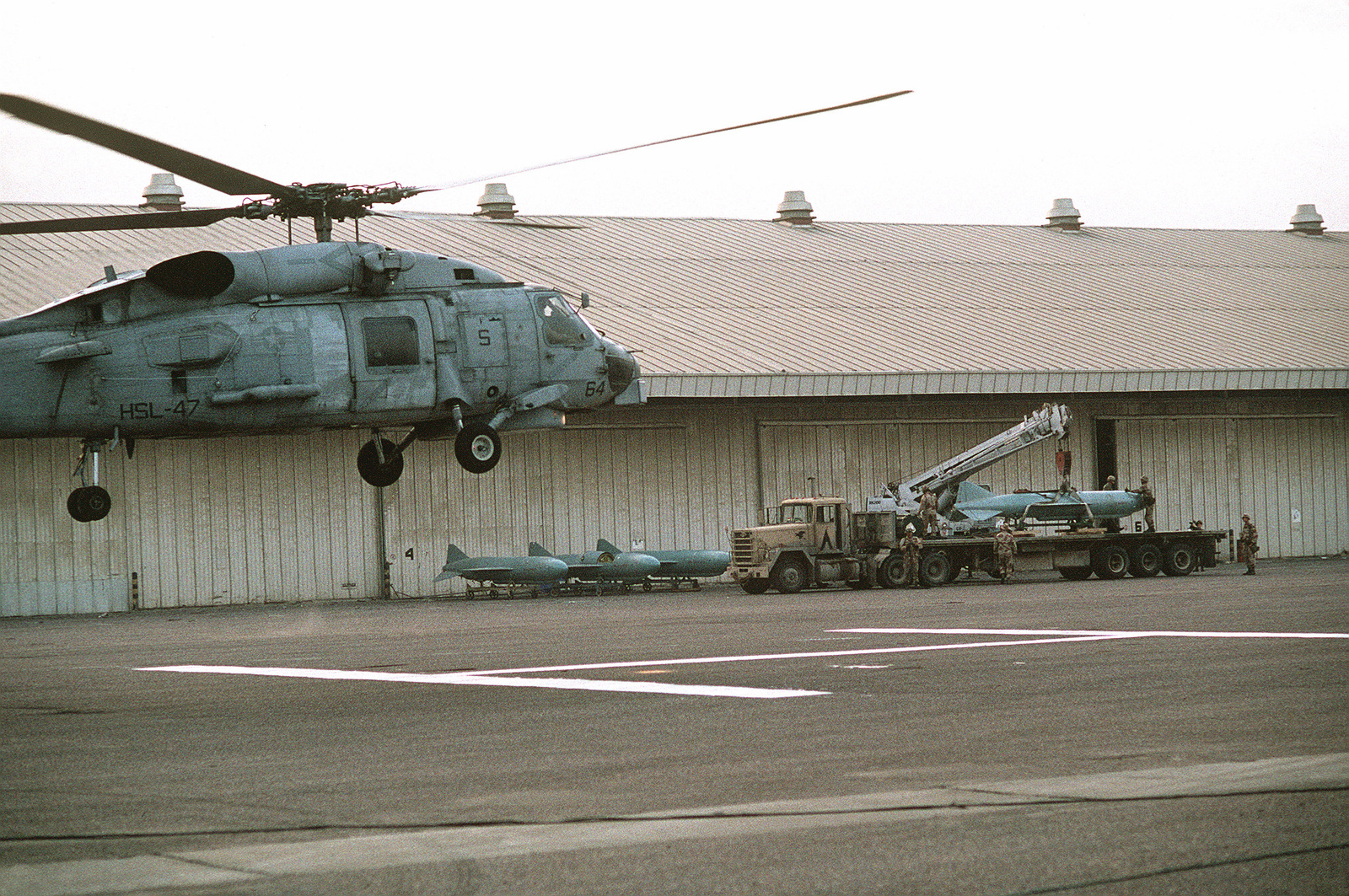 An SH-60B Sea Hawk Helicopter From Helicopter Light Anti-submarine ...