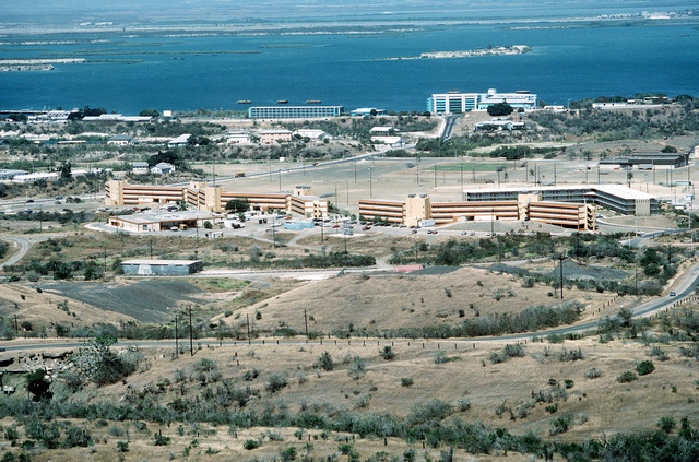 A view of a portion of the naval station. The buildings at center are ...