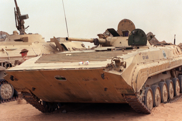 A left front view of a BMP-1 mechanized infantry combat vehicle that ...