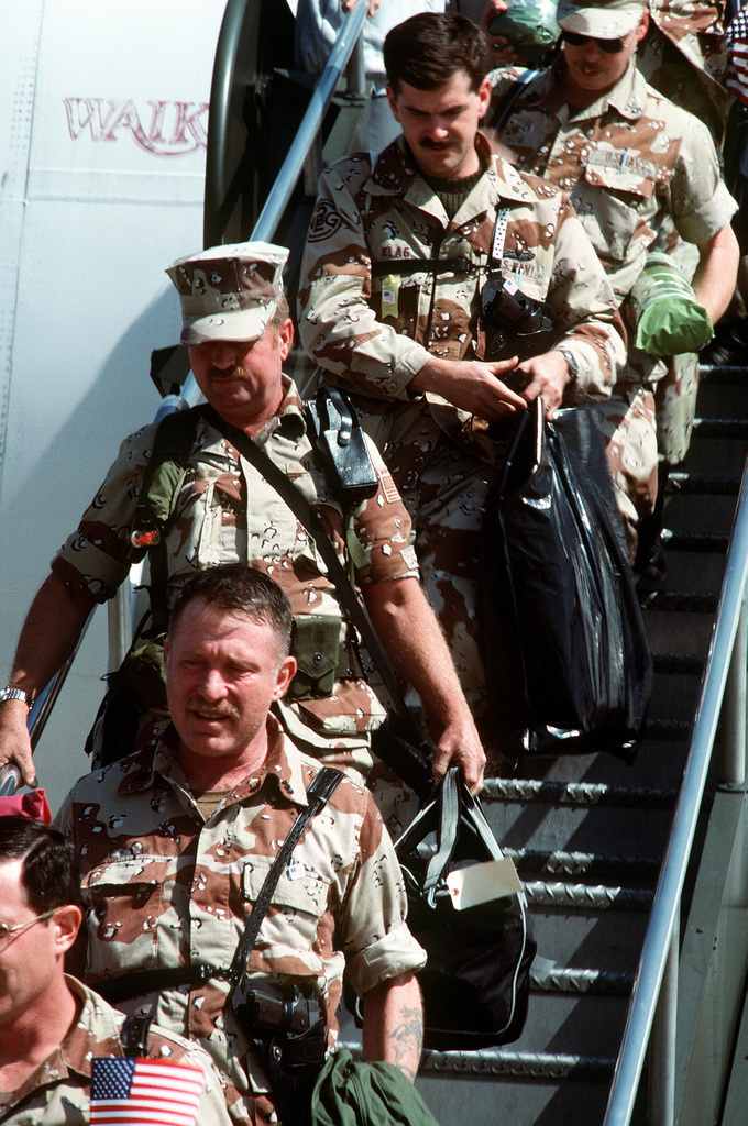 Members of U.S. Navy Beachmaster Unit 2 arrive at Naval Air