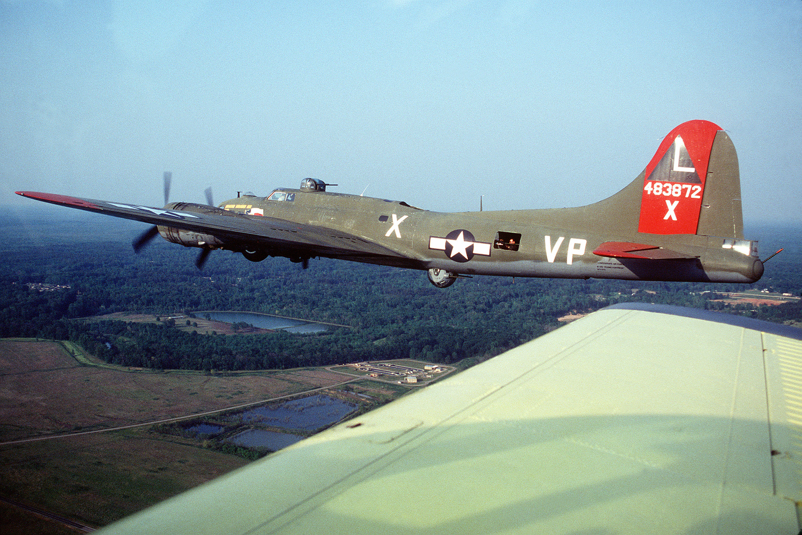 An Air To Air Left Side View Of The Restored World War Ii B 17g Flying Fortress Bomber Aircraft Known As Texas Raiders In Flight During The Annual Open House And Airshow U S National