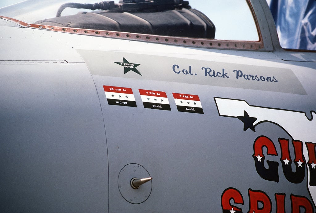 A close-up view of the flags painted on the side on a 33rd Tactical Fighter Wing F-15C Eagle aircraft on display at the 1991 Department of Defense Joint Services Open House. Each