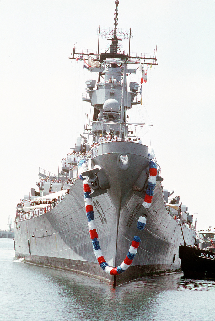 A garland decorates the bow of the battleship USS MISSOURI (BB-63) as a ...