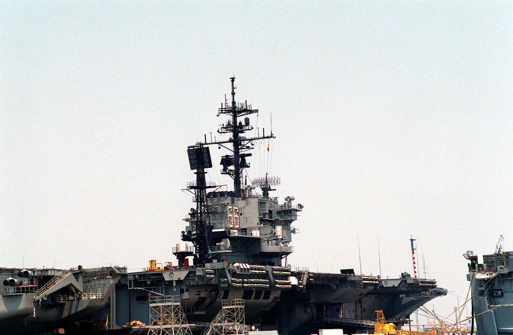 A view of the island of the aircraft carrier USS AMERICA (CV-66). The ...