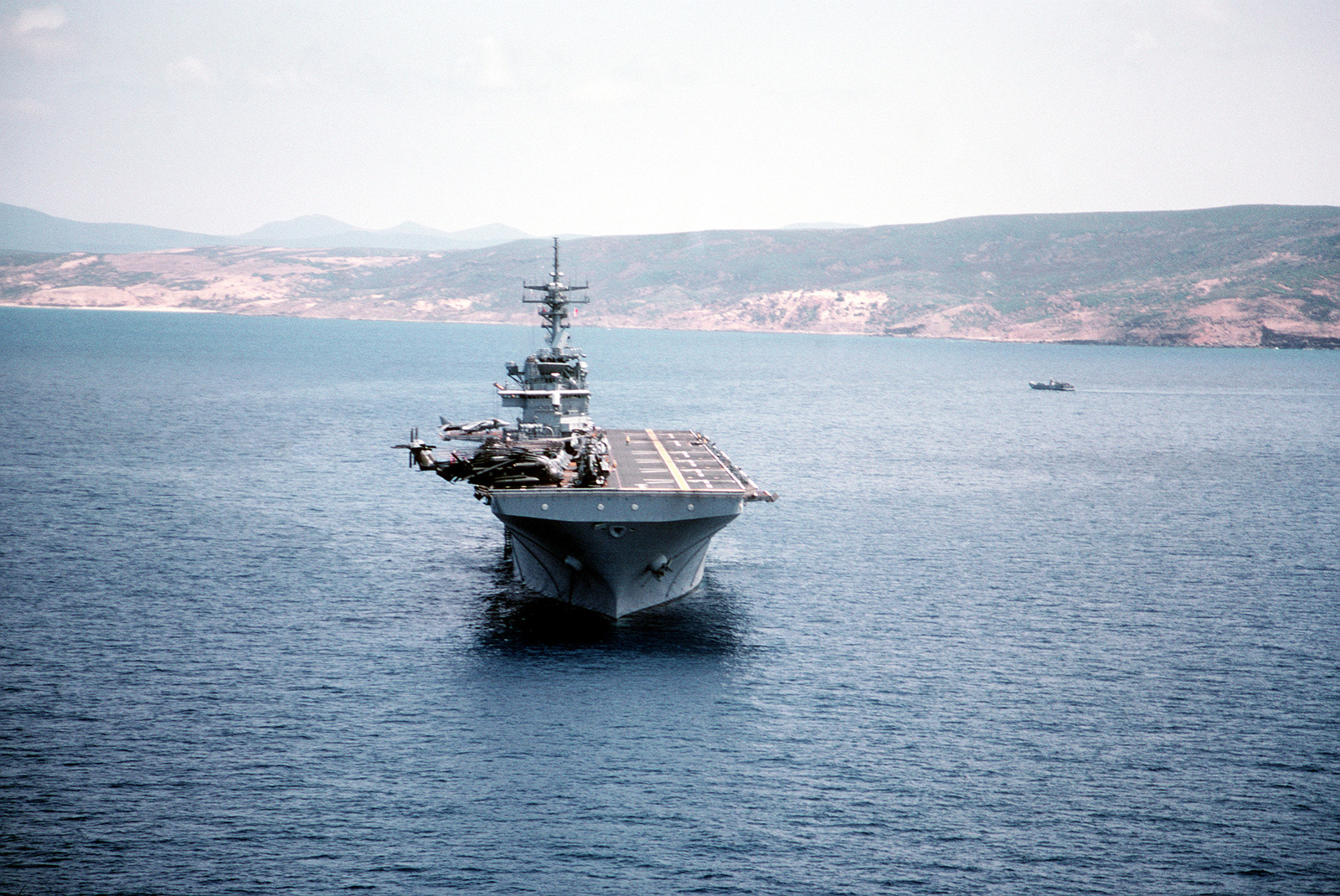 A bow view of the amphibious assault ship USS WASP (LHD 1) as it sits ...