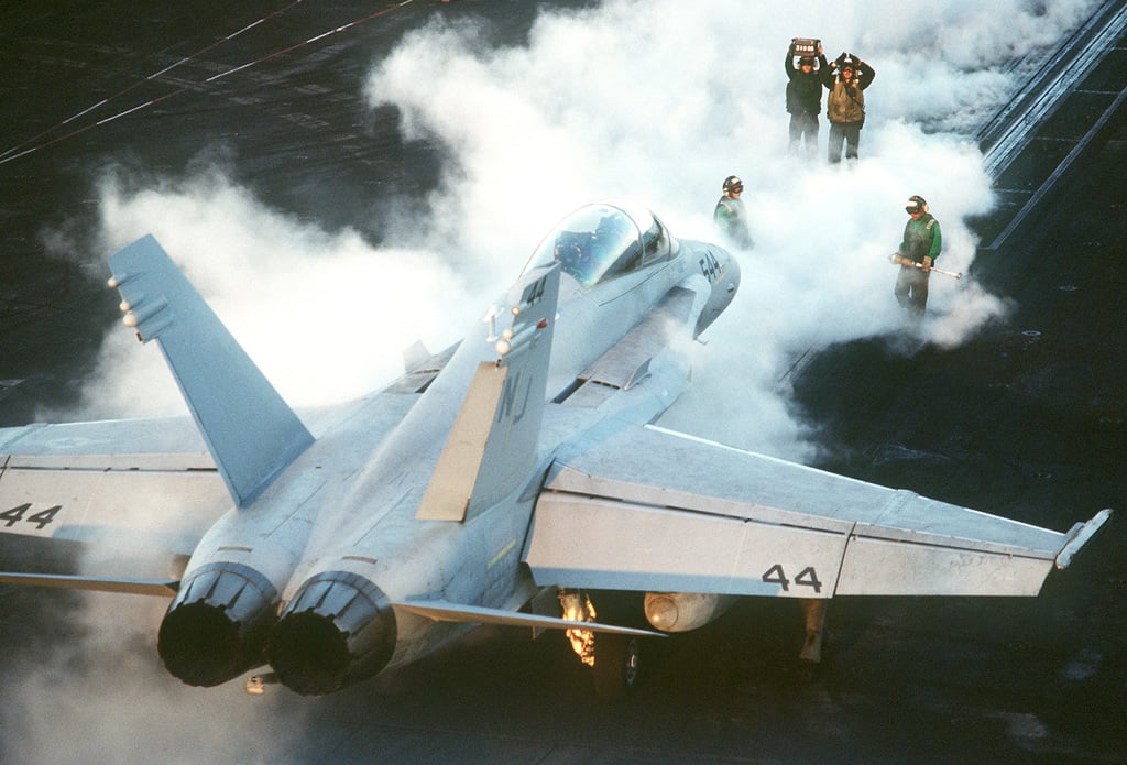 A Strike Fighter Squadron 125 (VFA-125) F/A-18D Hornet aircraft moves ...