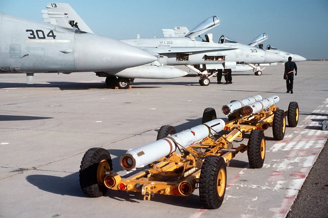 AIM-7 Sparrow Missiles Sit On A Pair Of Weapons Skids On The Flight ...