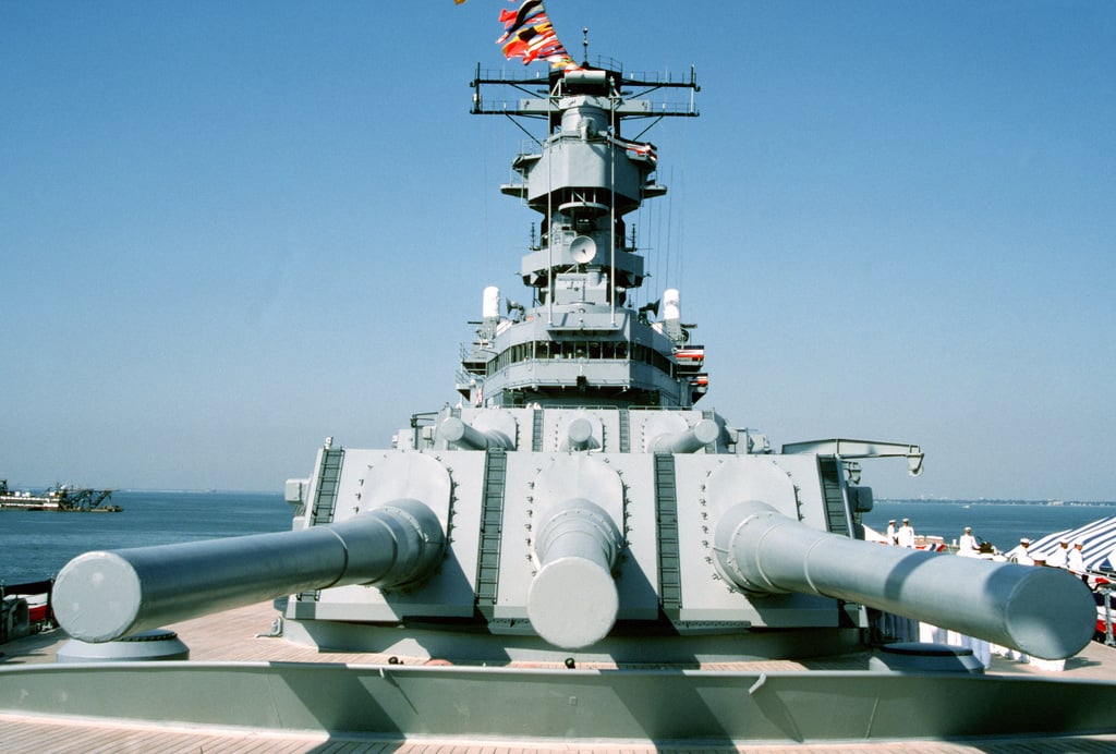 A view of two of the Mark 7 16-inch/50-caliber gun turrets and the ...