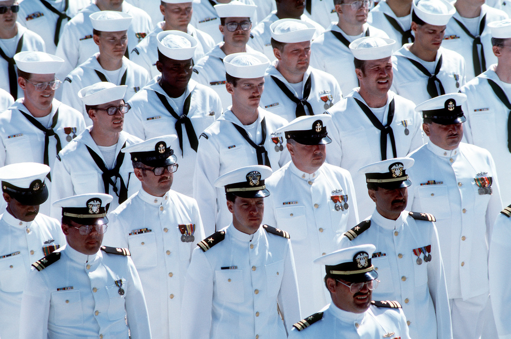 LCDR Louis Meier, lower left, executive officer of the guided missile ...