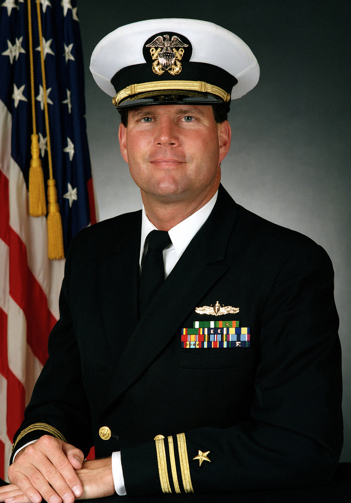 Lieutenant Commander Ritchie H. Belser, USN (covered) - NARA