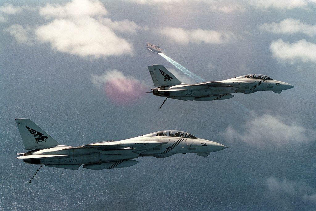 Right side view of two F-14B Tomcat aircraft of Fighter Squadron 143 ...