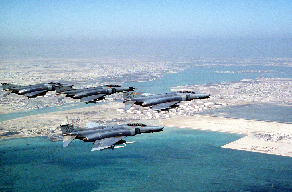 F-4G Phantom fighter aircraft from the 35th Tactical Fighter Wing, Tactical  Air Command, fly over the coastline of Bahrain during Operation Desert  Shield. The aircraft are armed with AGM-88 high-speed, anti-radiation,  air-to-surface