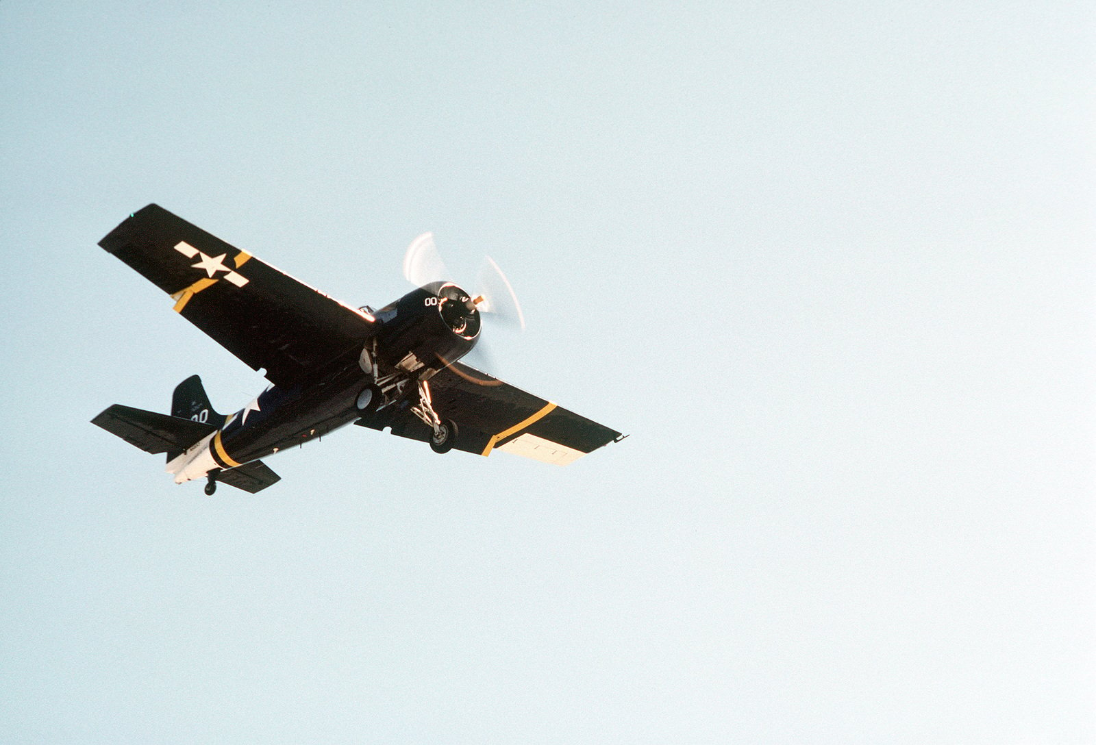 A Restored TBM Avenger Aircraft Soars Above The Deck Of The Aircraft ...