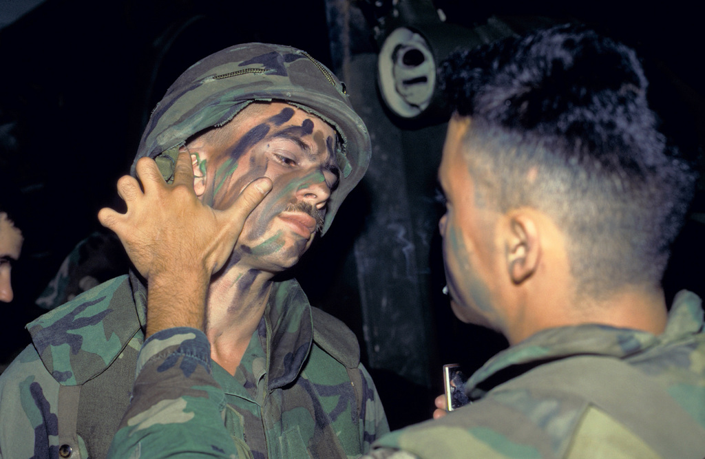 A Marine wearing camouflage face paint participates in Exercise SOLID  SHIELD '83 - NARA & DVIDS Public Domain Archive Public Domain Search