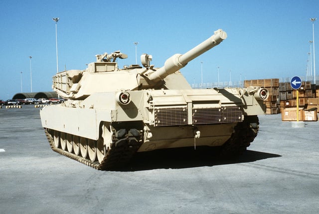 An M-1A1 Abrams main battle tank, freshly painted in desert camouflage ...