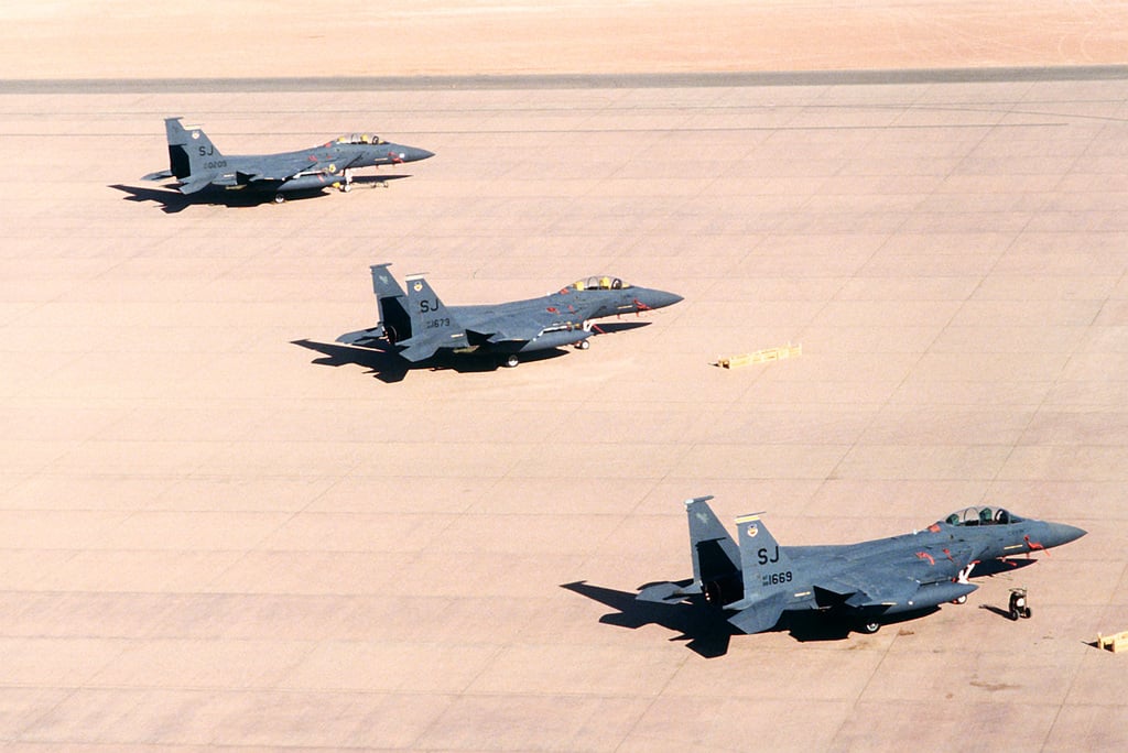 F-15E Eagle aircraft of the 4th Tactical Fighter Wing stand on the ...