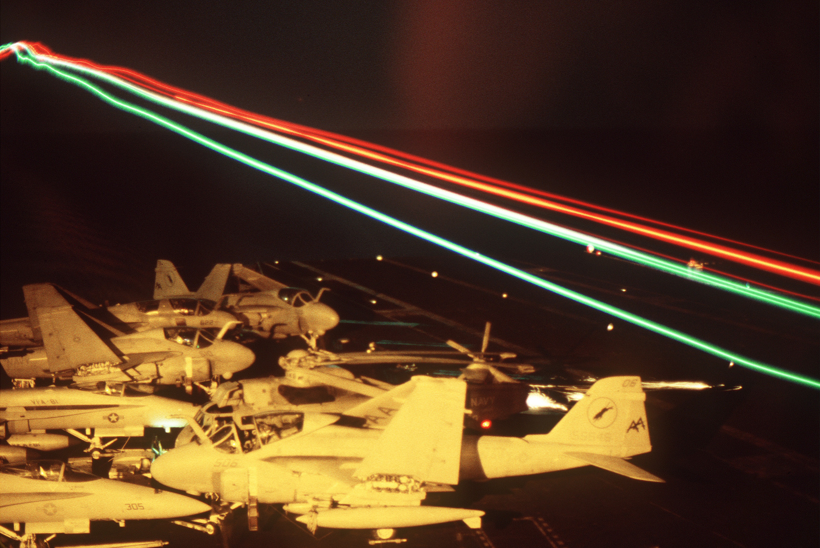 The Running Lights Mark The Path Of An Aircraft Landing At Night On The  Aircraft Carrier Uss Saratoga (Cv-60) - Nara & Dvids Public Domain Archive  Public Domain Search