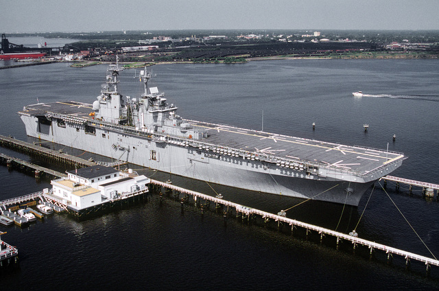 A starboard view of the amphibious assault ship USS WASP (LHD-1) moored ...