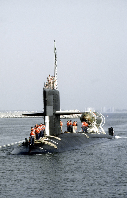 Crewmen Stand Ready On The Deck Of The Nuclear-powered Attack Submarine 