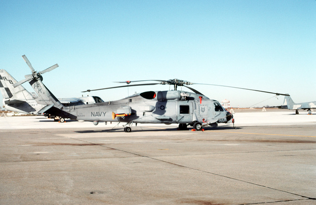 A right side view of a Helicopter Light Anti-submarine Squadron 40 (HSL ...