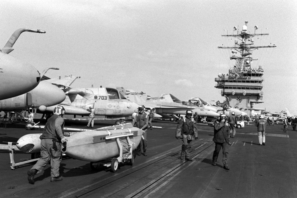 Members of the Tactical Electronic Warfare Squadron 138 (VAQ-138) move ...