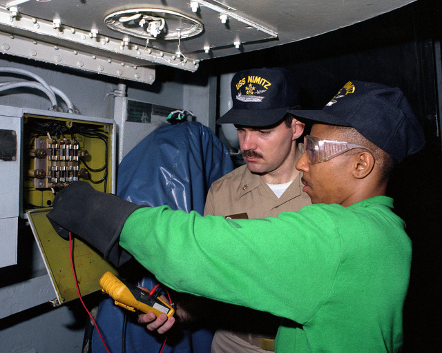 Electrician's Mate 3rd Class Eddie Hendrix And Chief Electrician's Mate 