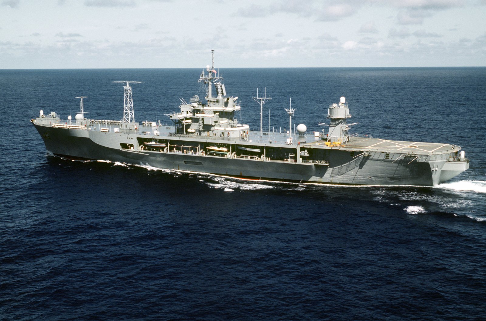 A port quarter view of the amphibious command ship USS MOUNT WHITNEY ...