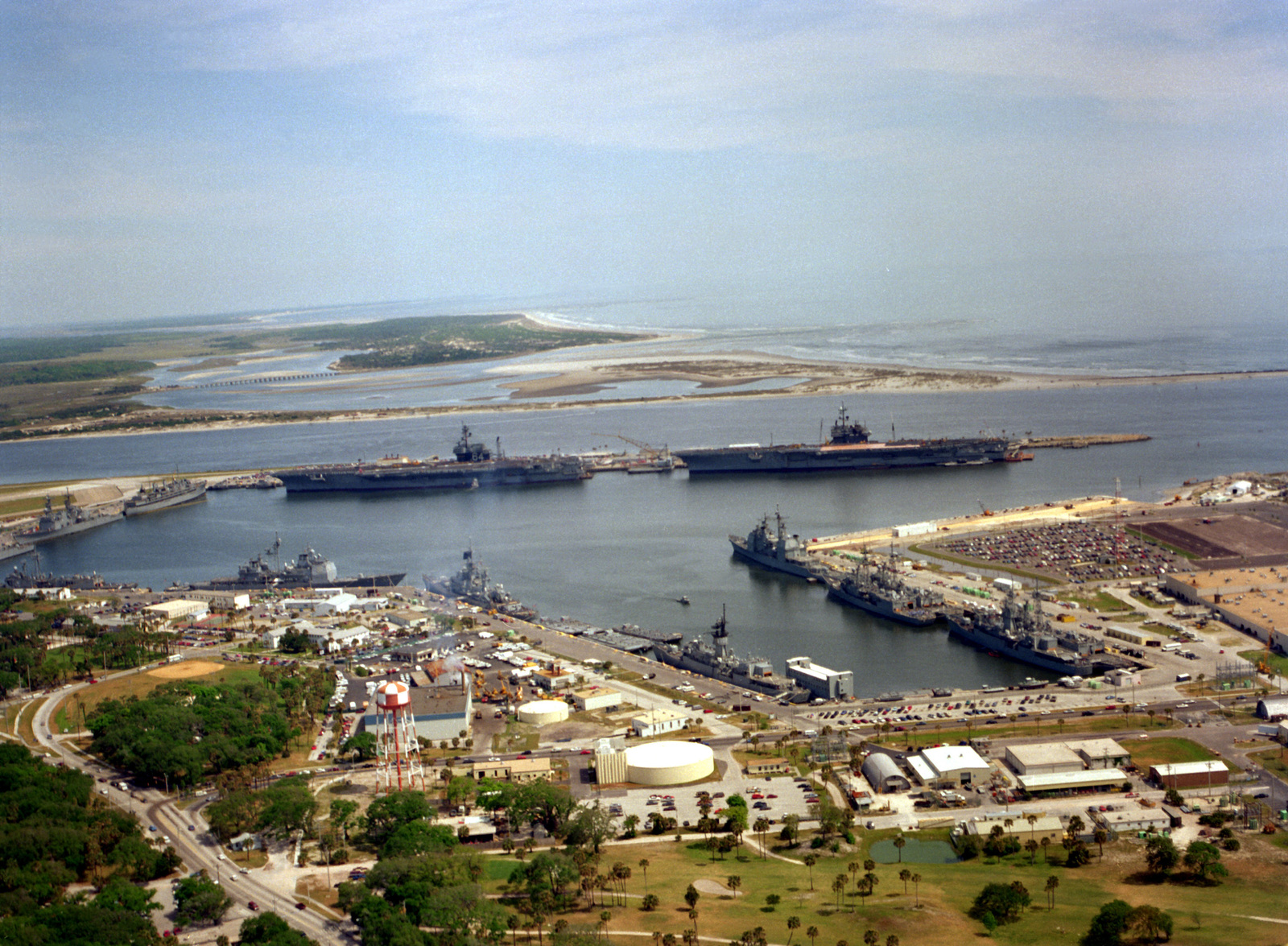 An aerial view, looking north, of the naval station with the aircraft ...