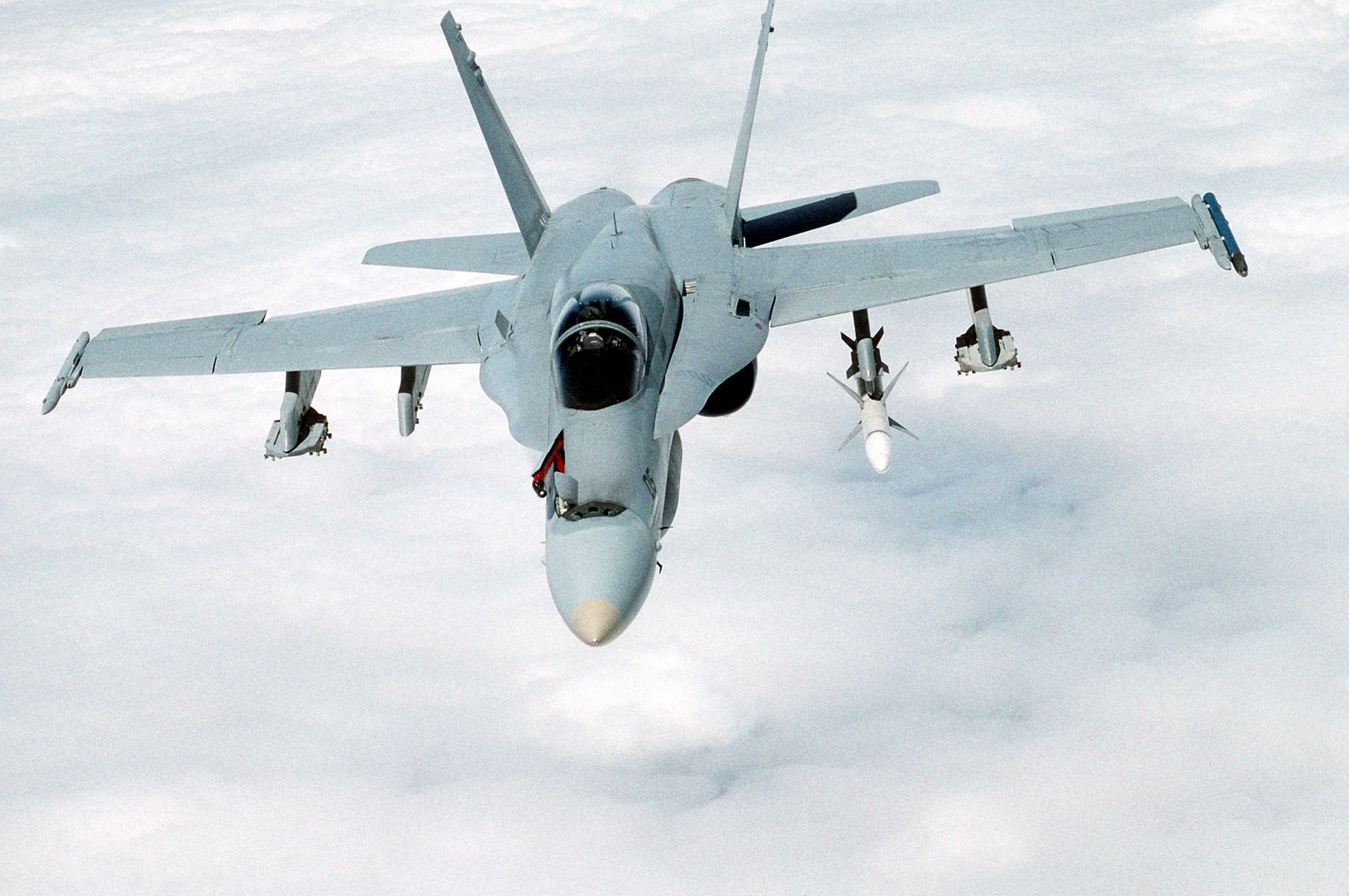 An air-to-air front view of a Marine Fighter Attack Squadron 321 (VMFA ...