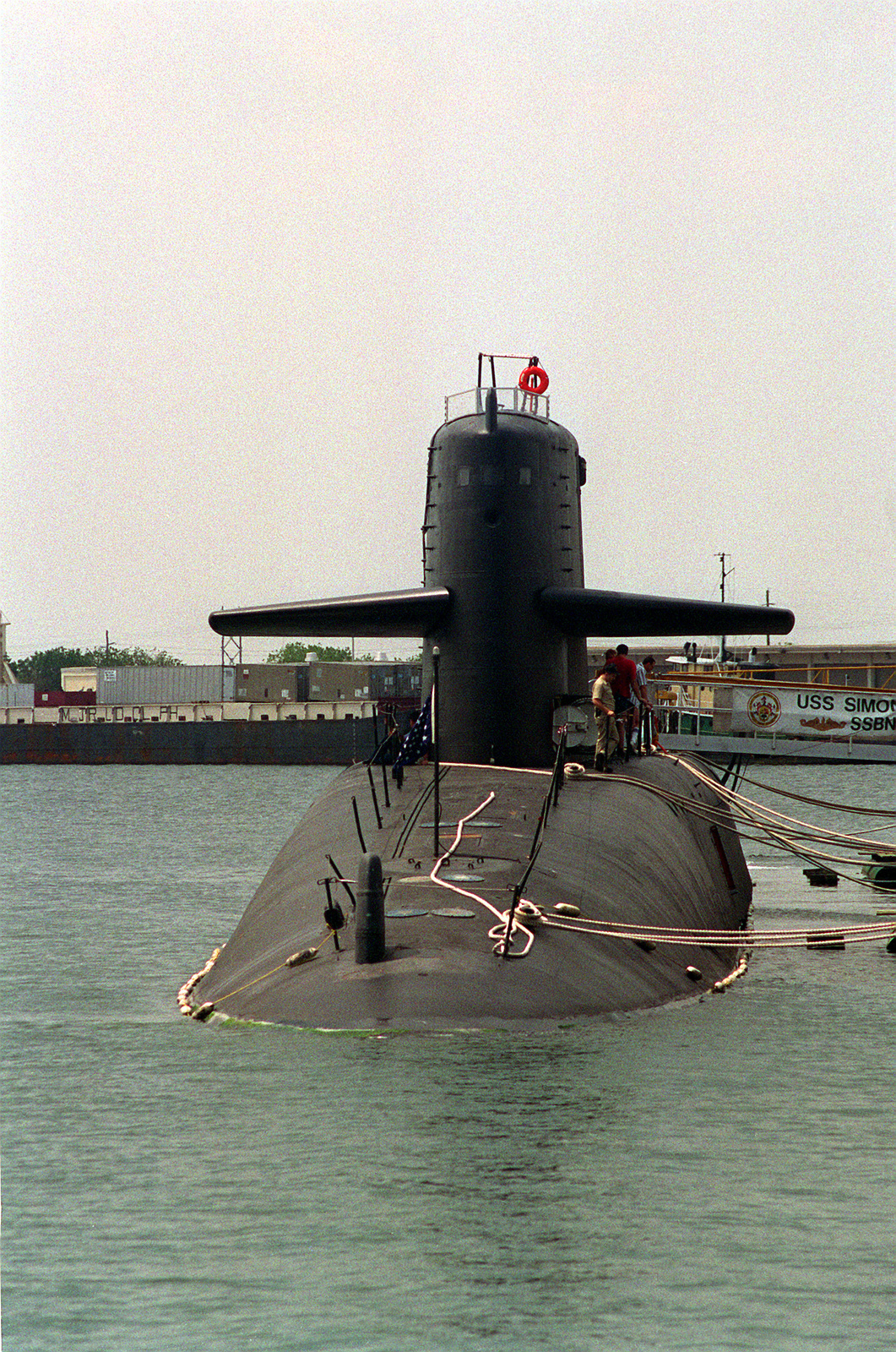 A bow view of the nuclear-powered strategic missile submarine USS SIMON ...