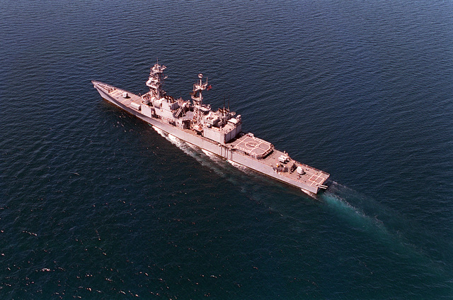 A port quarter view of the destroyer USS CONOLLY (DD-979) underway off ...